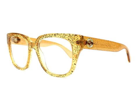 gucci glasses gold bone|Gucci clear and gold glasses.